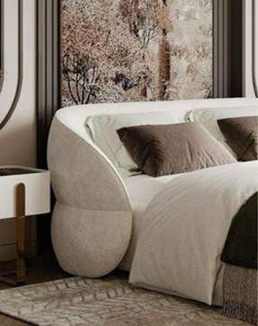 Living room accent chair against a textured wall